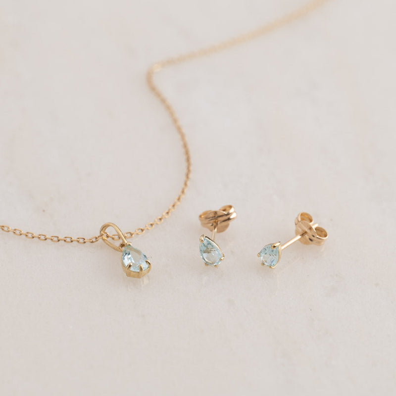 ADA BLUE TOPAZ SOLID GOLD EARRING