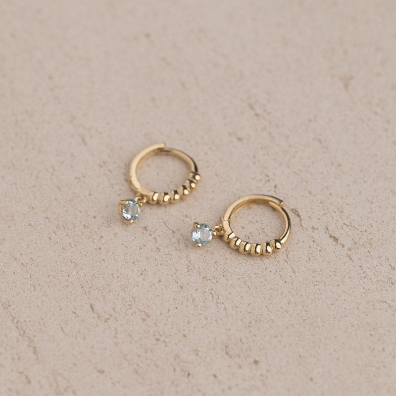 INGRID BLUE TOPAZ SOLID GOLD EARRING